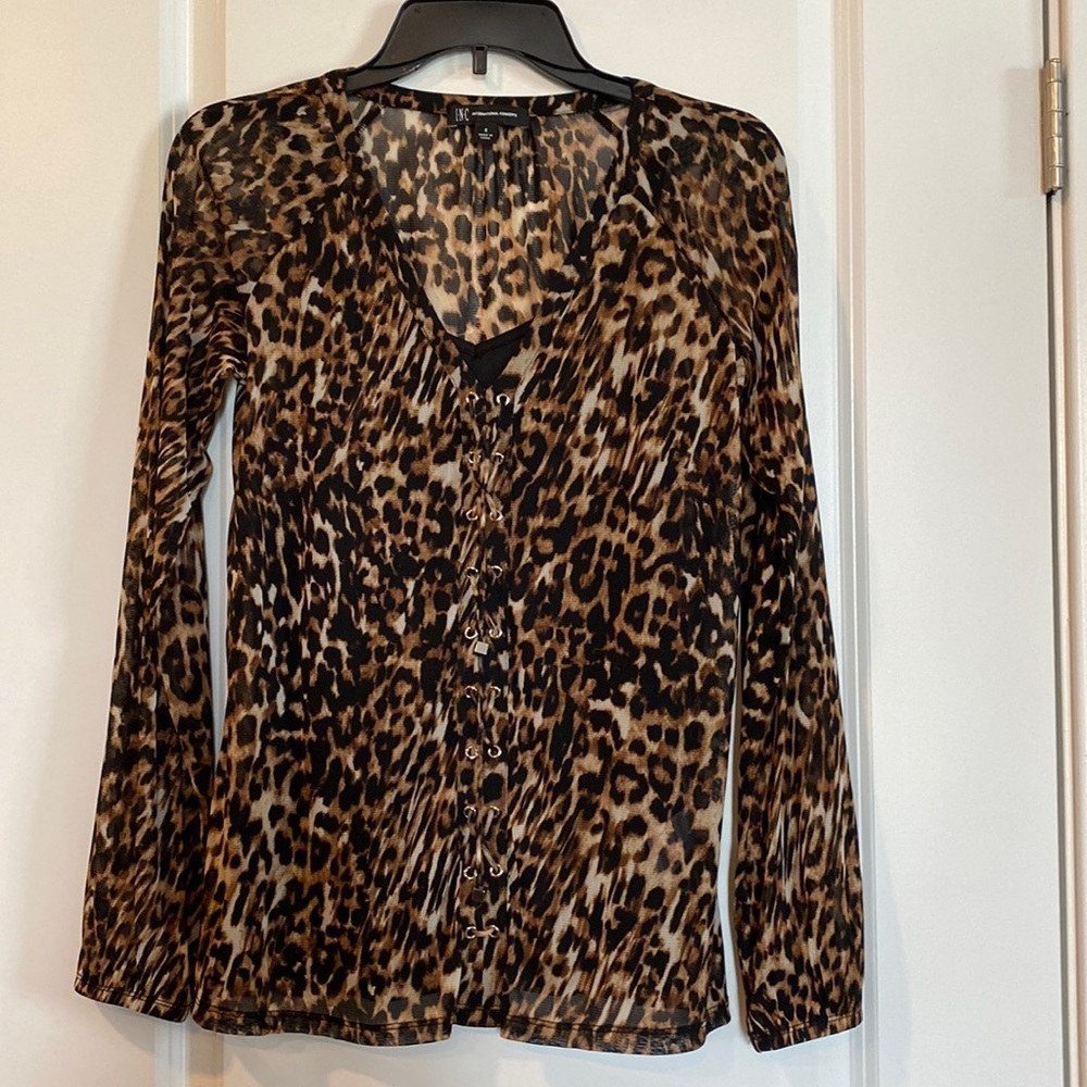 NWOT Inc two piece Leopard mesh lace up top with a black camisole for coverage.